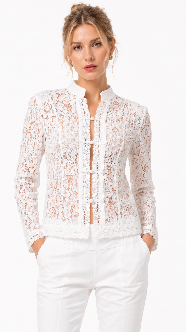 Élégante et raffinée, la Chemise Alésia célèbre le savoir-faire parisien à travers une dentelle florale délicate et une silhouette féminine parfaitement structurée. Confectionnée à Paris, cette création allie légèreté, confort et sophistication pour accompagner chaque instant avec grâce.

Son col officier, ses finitions délicates et sa fermeture à brides inspirée de l’élégance couture lui confèrent une allure singulière et intemporelle. Une pièce d’exception qui sublime aussi bien un pantalon tailleur qu’un