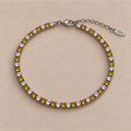 Bracelet Montou en argent 925, alternance de cristaux et de nano saphirs jaunes, avec fermoir et chaînette de réglage.